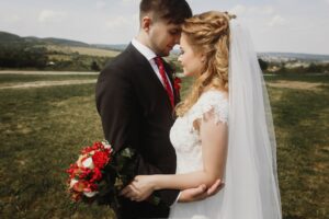 gorgeous-bride-and-groom-posing-at-field.jpg